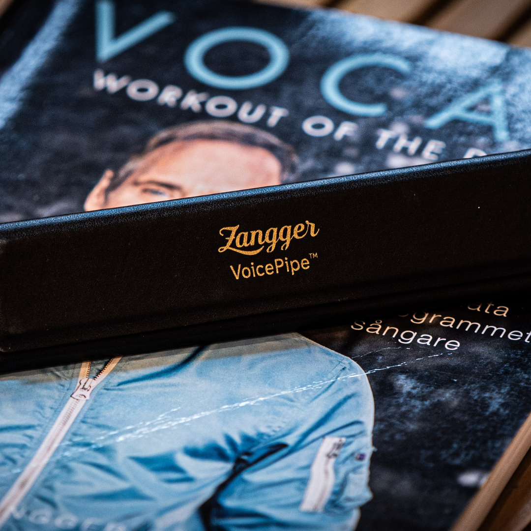 Close-up of the gold Zangger VoicePipe logo embossed on the black protective case