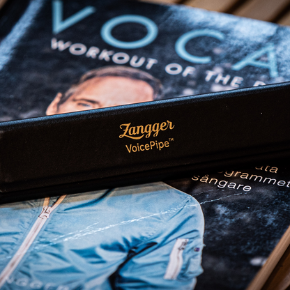 Close-up of the gold Zangger VoicePipe logo embossed on the black protective case